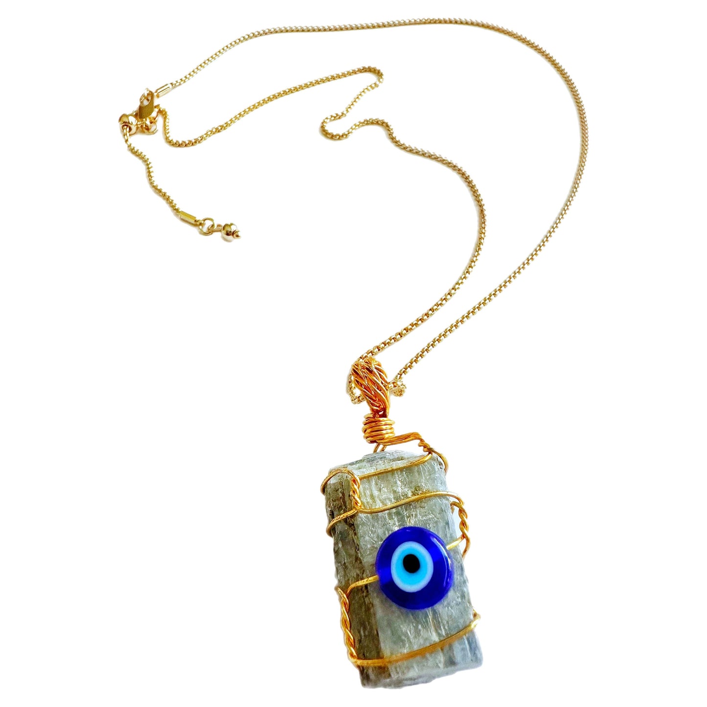 Colgante envolvente de calcita azul y mal de ojo | Ritualizado